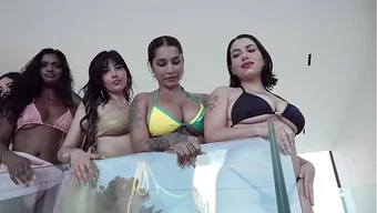 A group of 9 sexy girls organized an orgy with 4 guys in a stunning mansion.