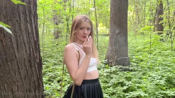 Beautiful woman smoking in the forest gets anal sex and piss in her mouth